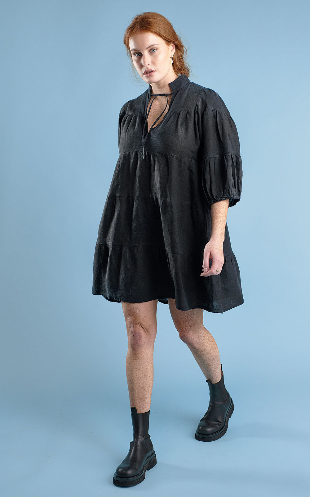 tiered mini dress with tie up neck in black