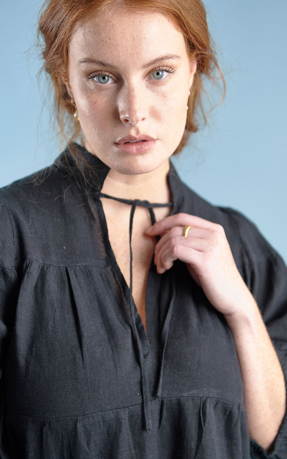 tiered mini dress with tie up neck in black