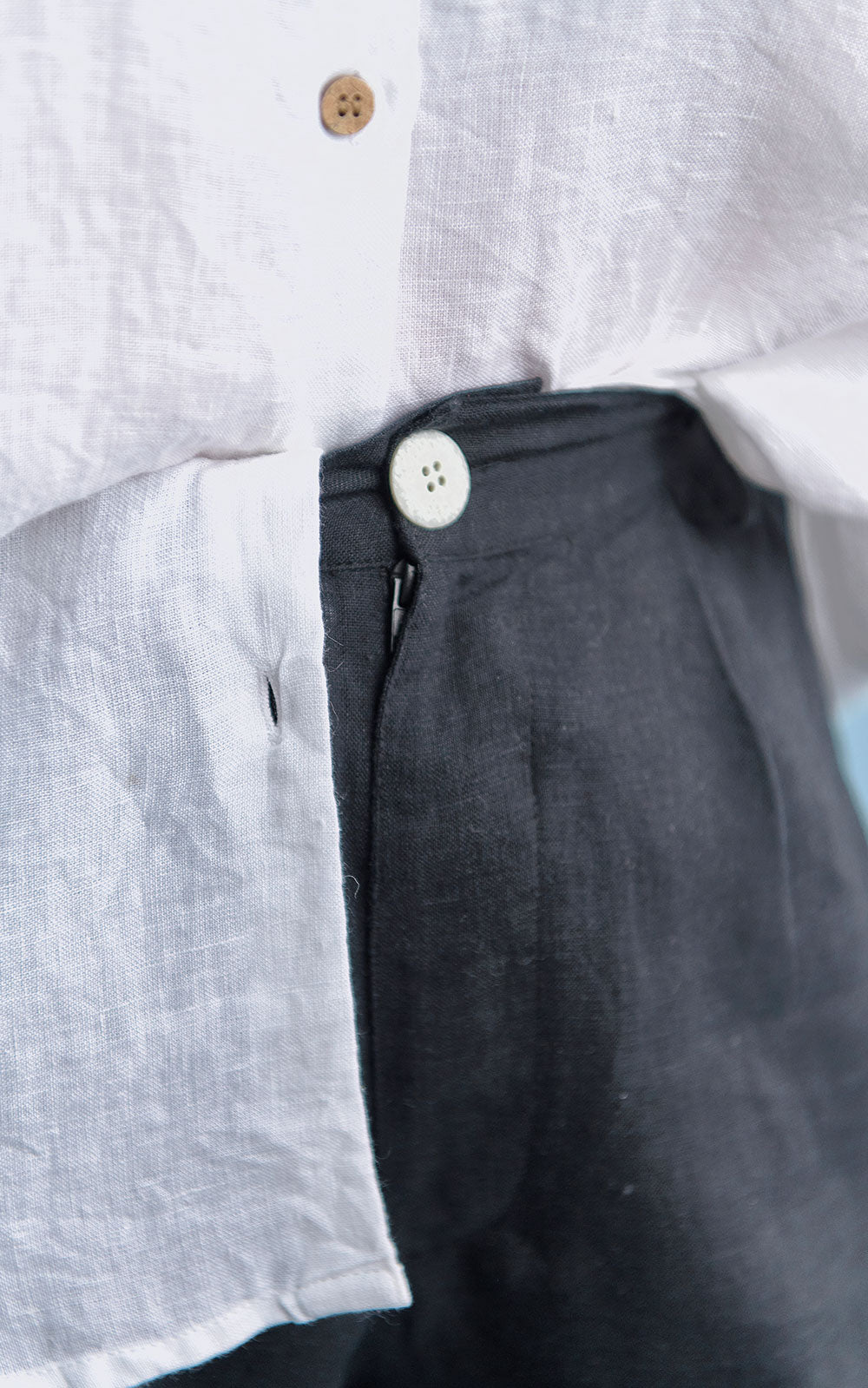 three quarter length tailored linen shorts in black