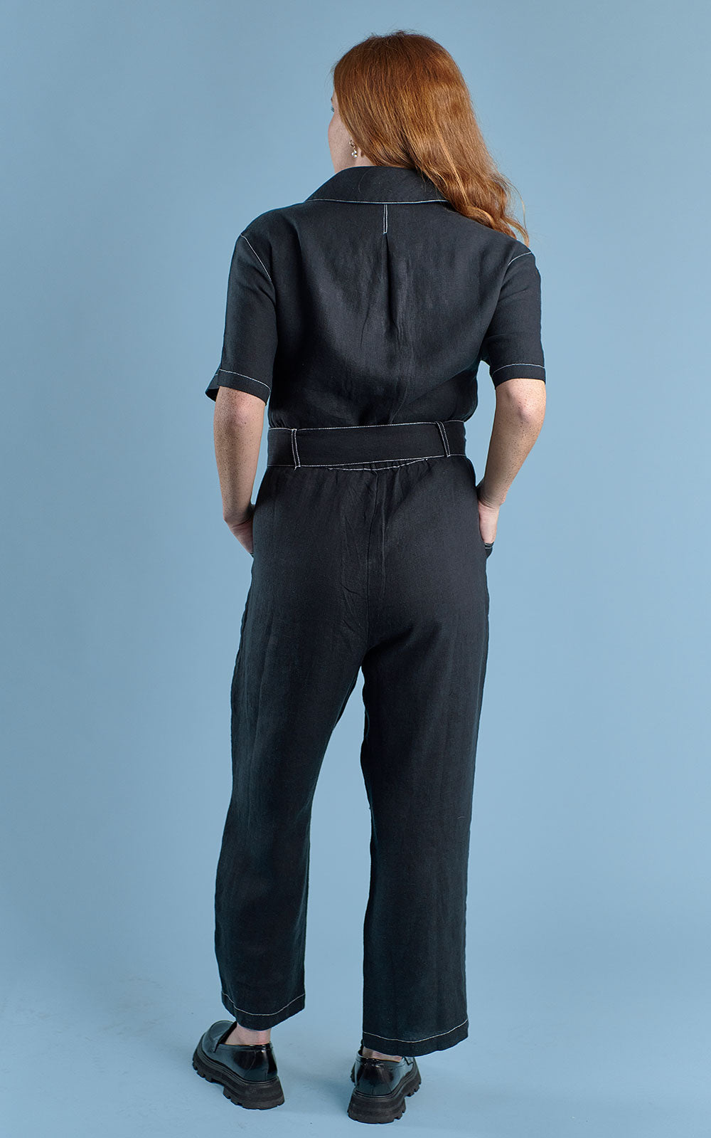 boiler suit in black linen with contrast stitching