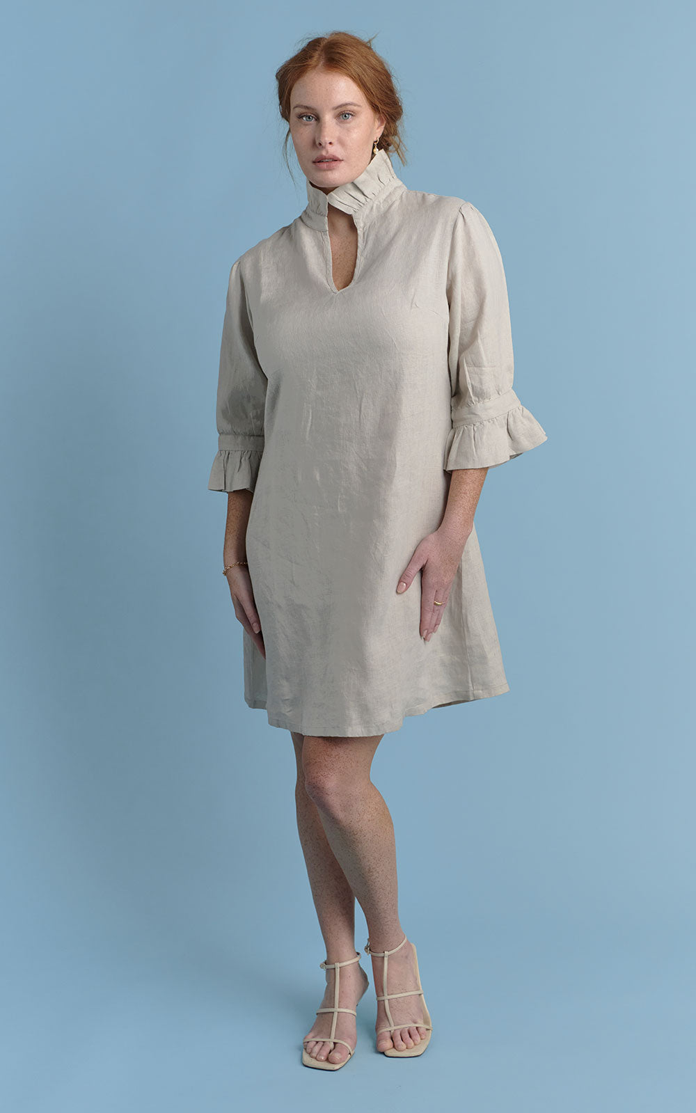 natural linen mini dress with high neck frill and sleeves