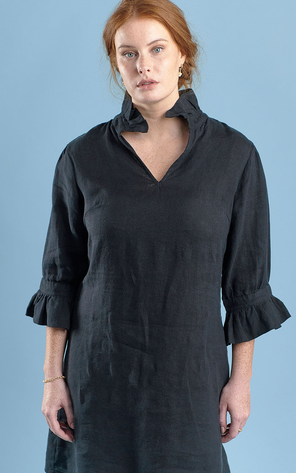 black linen mini dress with high neck frill and sleeves