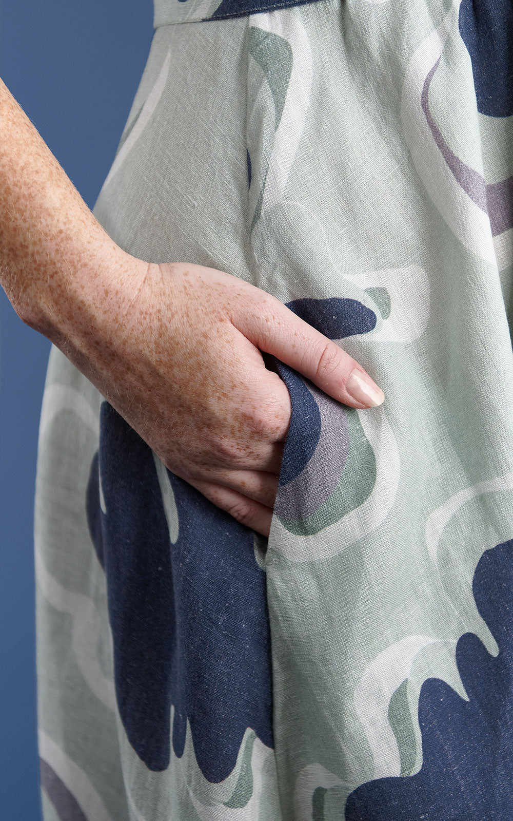 navy and seamist print linen maxi dress with v neck and middle leg split including tie belt