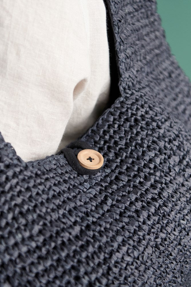 beach bag with button enclosure and cotton lining black