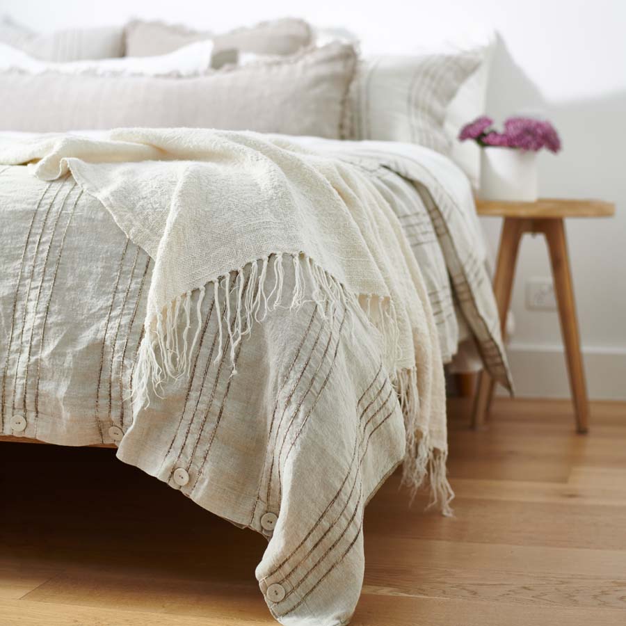 rockpool linen quilt cover and linen pillow cases in natural with organic stripe