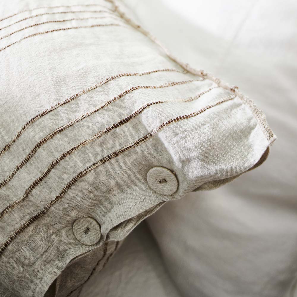 rockpool linen quilt cover and linen pillow cases in natural with organic stripe