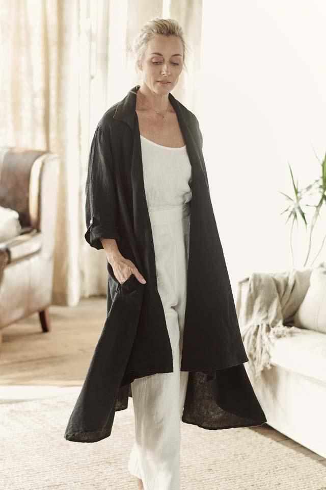 Euro linen white cami and euro linen white wide leg pant layered with the black cascade coat