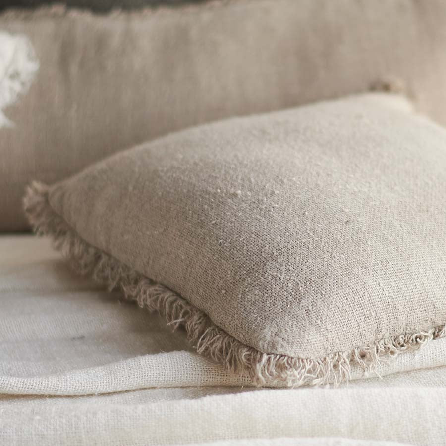 Natural Bedouin Euro linen cushion with frayed edges and 100% feather filled insert