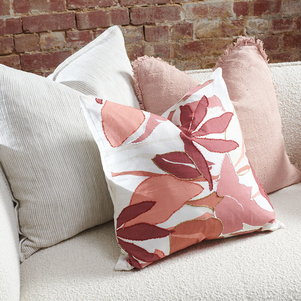 linen cushion with folral print in pinks; rose dust, desert rose, musk, apricot and white