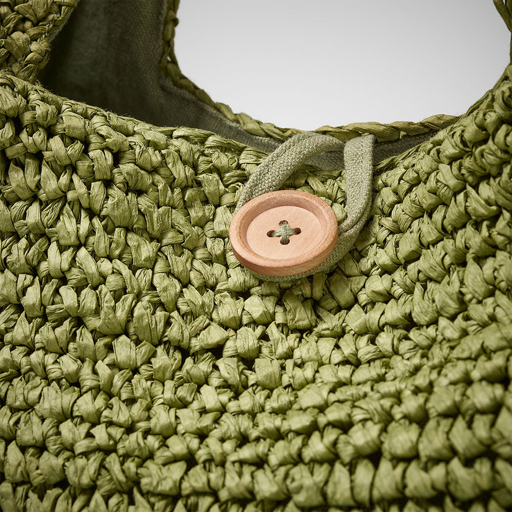 beach bag with button enclosure and cotton lining green