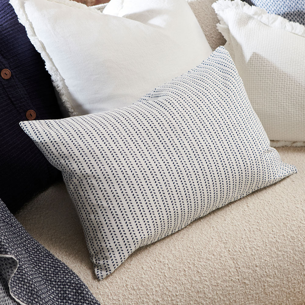 100% linen cushion in white and navy small leaf pattern repeat
