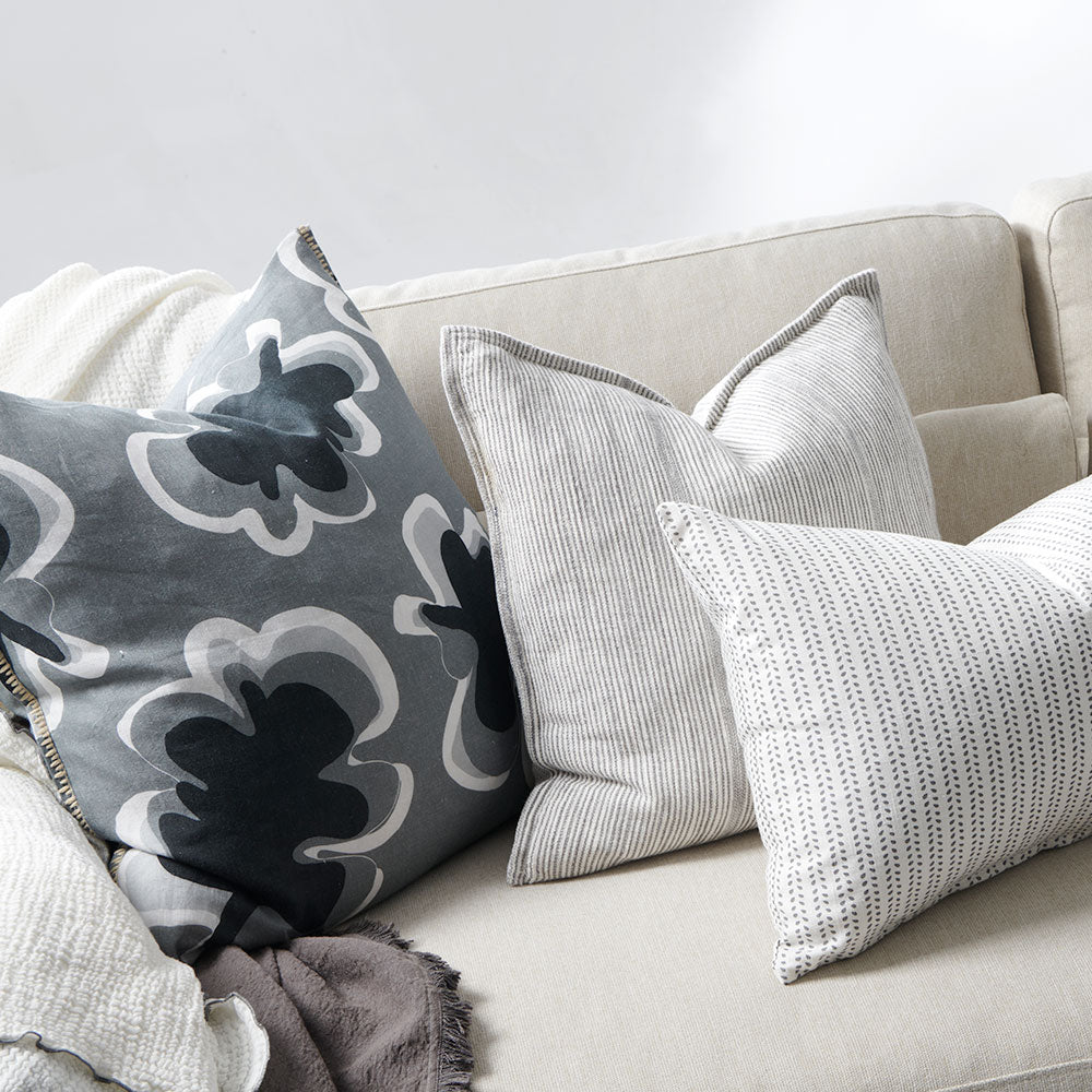 black, grey and white fun patterned linen cushion with contrast stitching feature