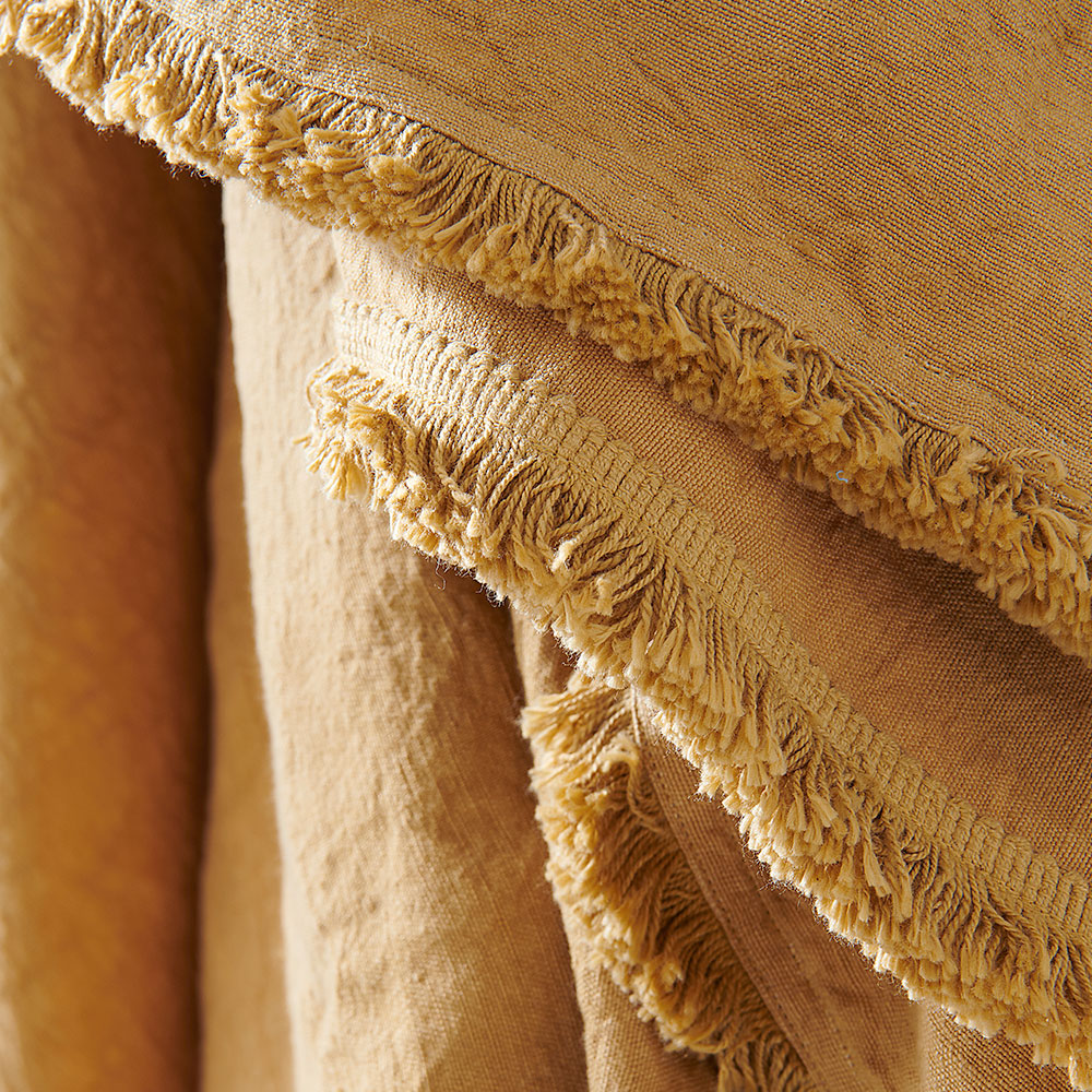 100% linen throw with fringe edge feature in turmeric, golden yellow colour