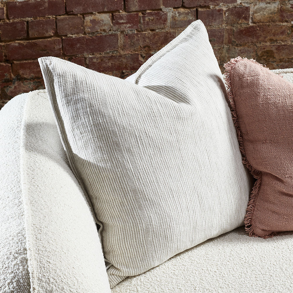 100% linen cushion in a natural and white faint stripe pattern which is reversible