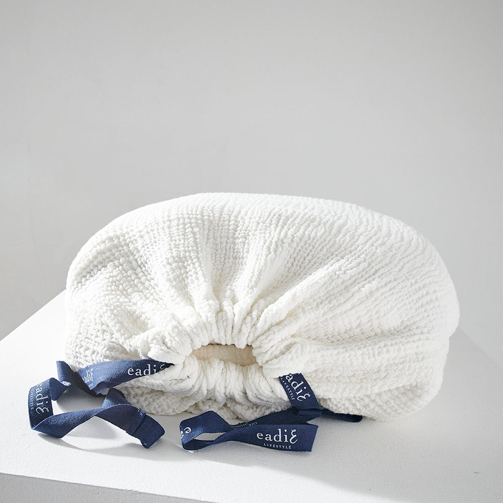 white duvet set with contrast stitching, lettuce edge and wooden button feature