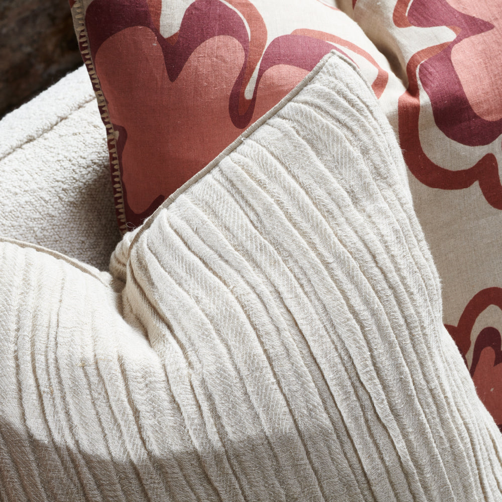 ribbed soft blend of linen and cotton cushion in a natural colour with piping feature