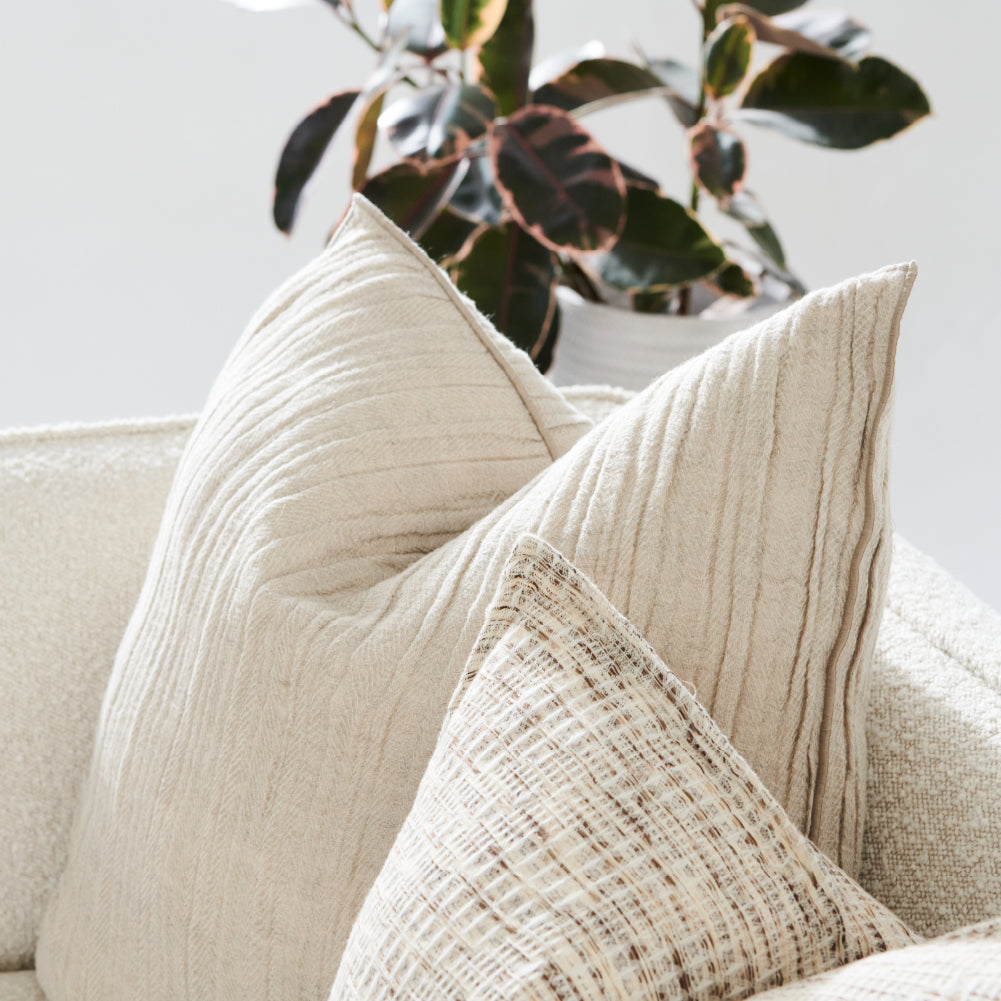 ribbed soft blend of linen and cotton cushion in a natural colour with piping feature