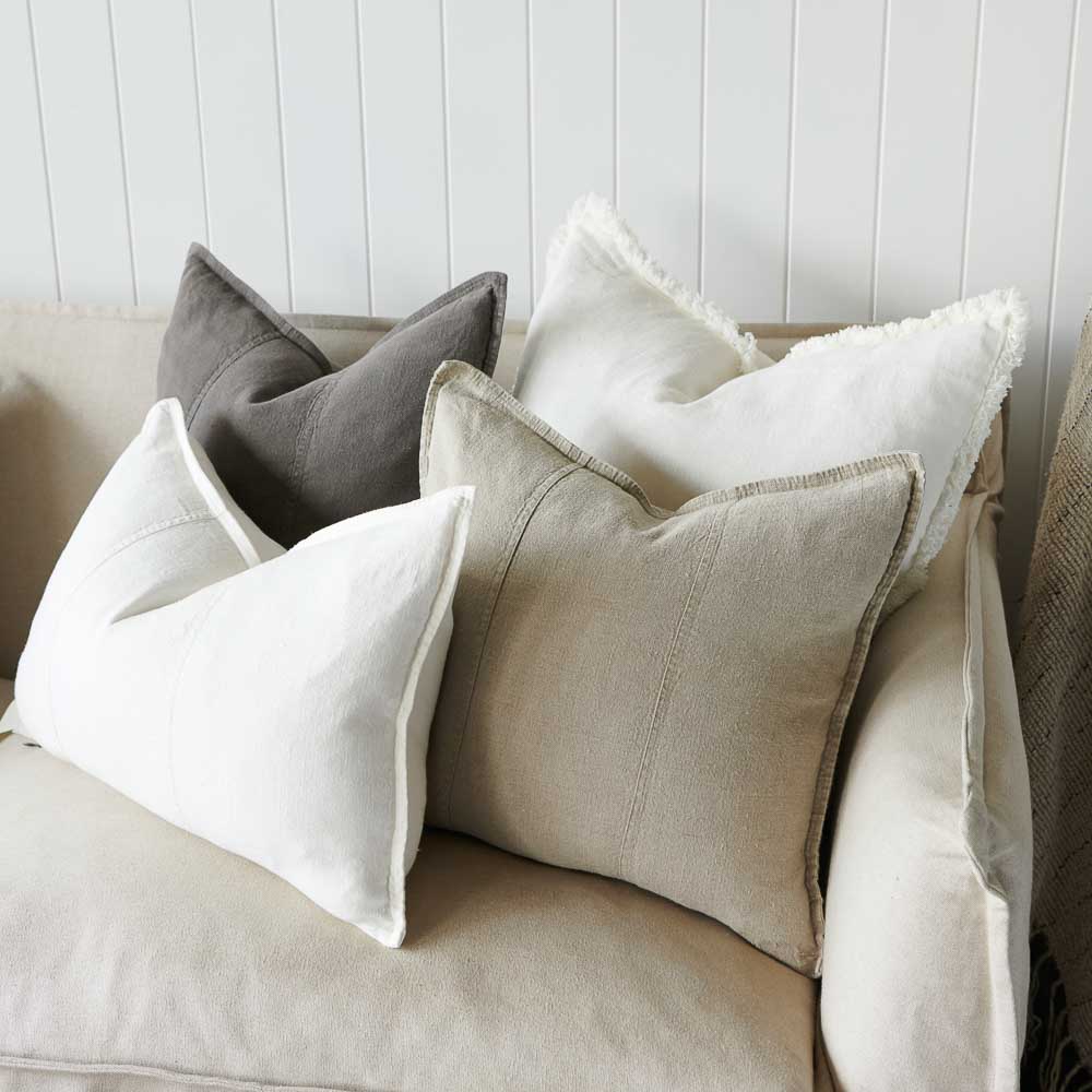Luca linen cushions and luca boho cushions on a sofa
