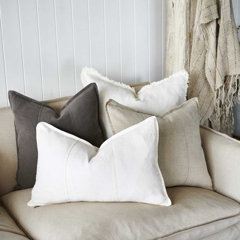 Luca linen cushions and luca boho cushions on a sofa