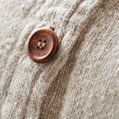 Button detail on the Mayla Hand Woven Cushion