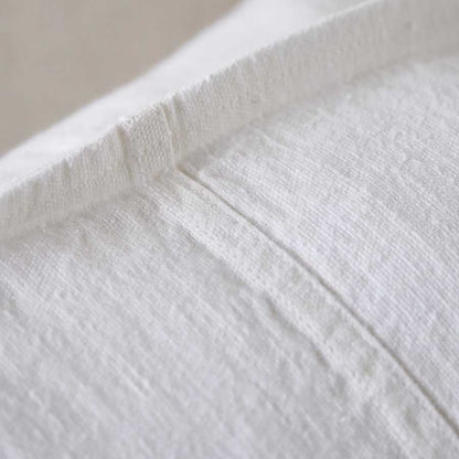 Luca Linen Cushion in white crafted from 100% pre washed linen