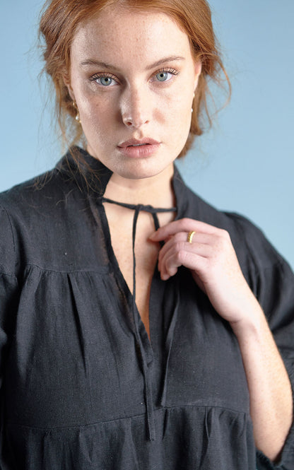 tiered mini dress with tie up neck in black