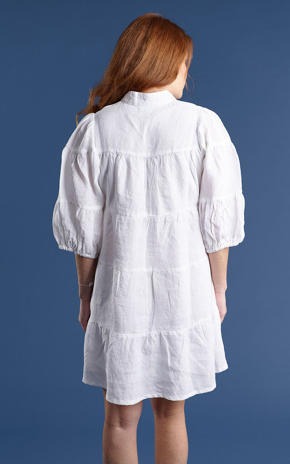 tiered mini dress with tie up neck in white