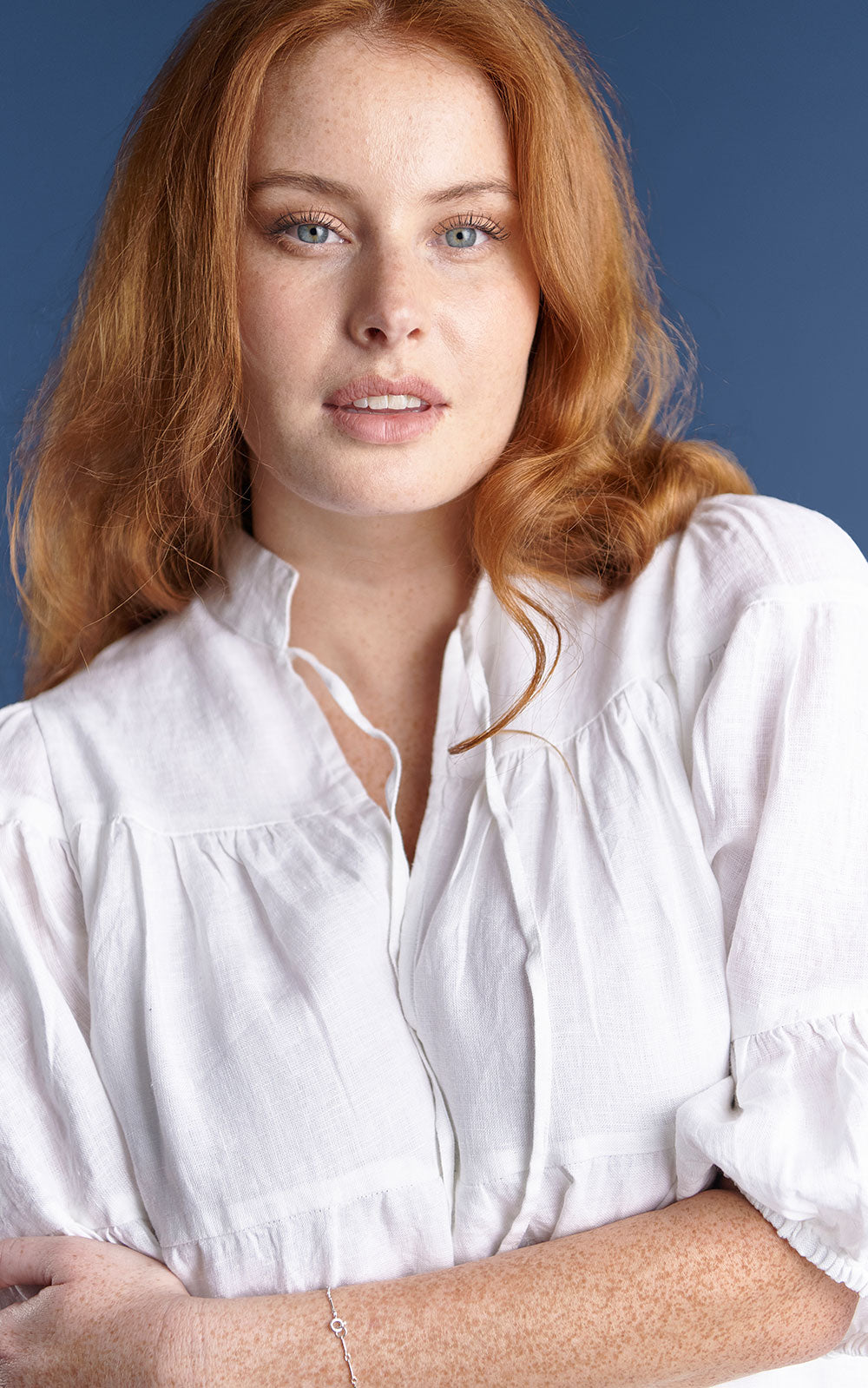 tiered mini dress with tie up neck in white