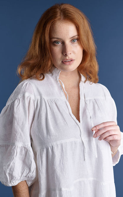 tiered mini dress with tie up neck in white