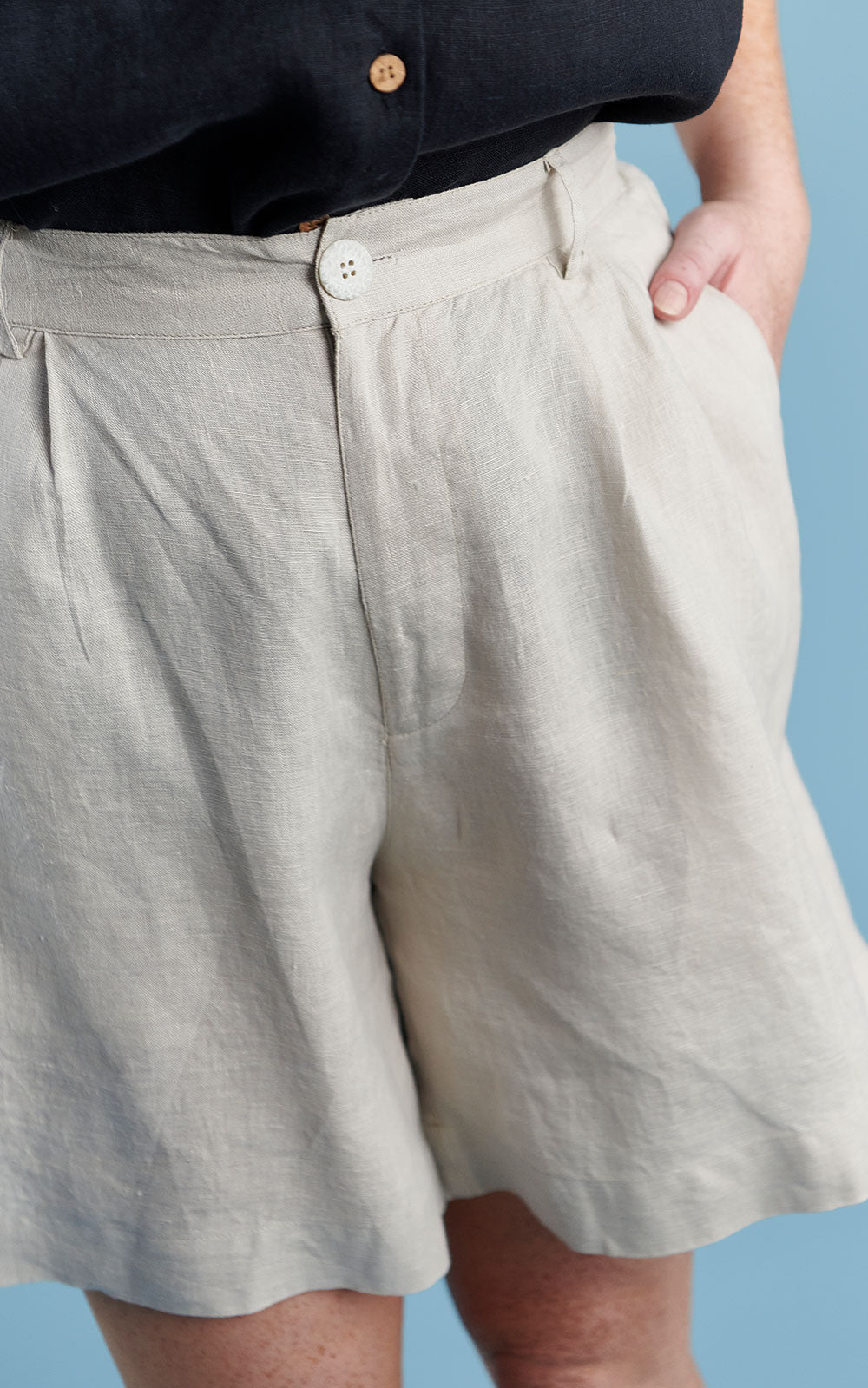 three quarter length tailored linen shorts in natural
