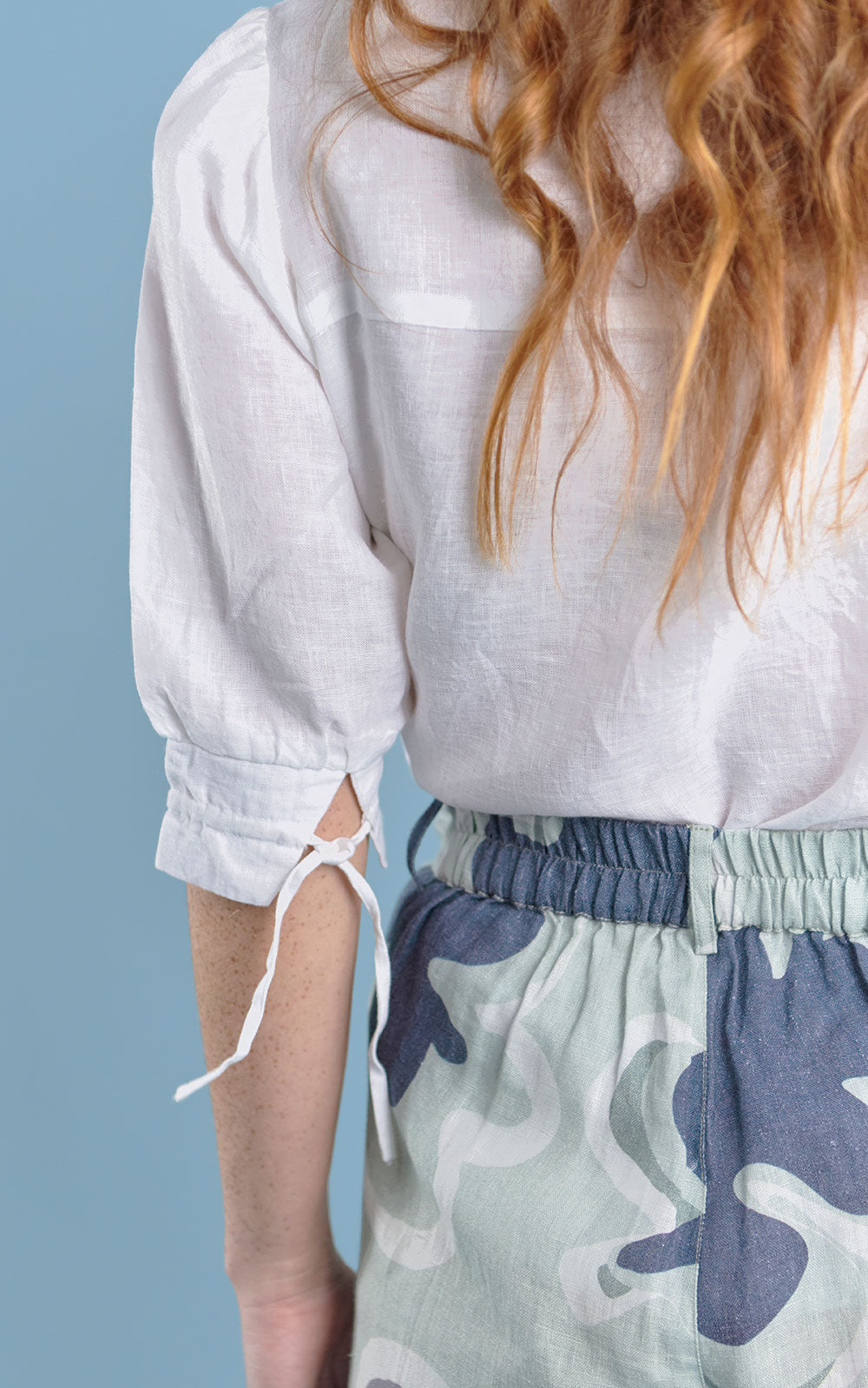 Button up blouse with pleats in white