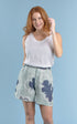 three quarter length tailored linen shorts in navy and seamist print gidget