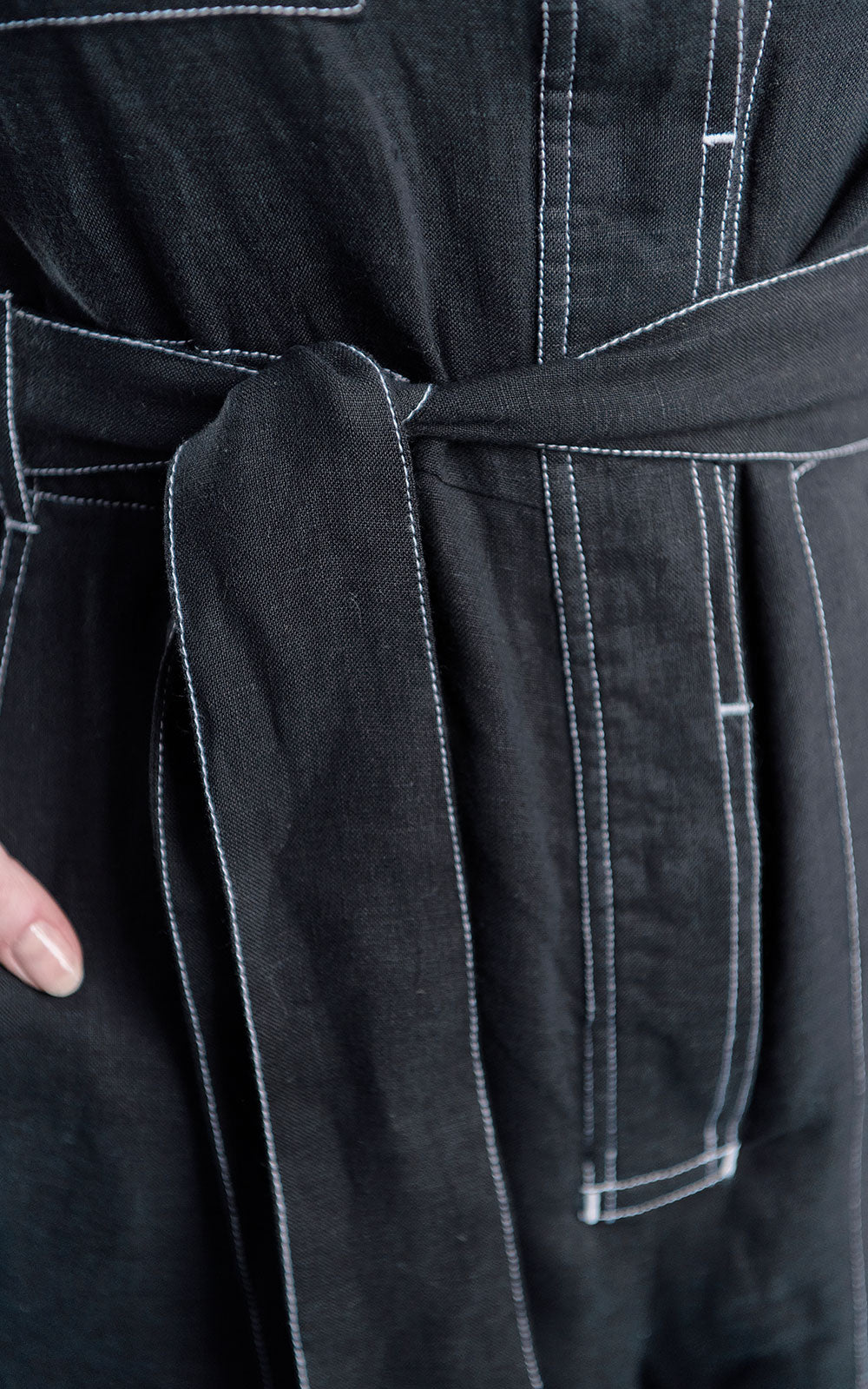 boiler suit in black linen with contrast stitching