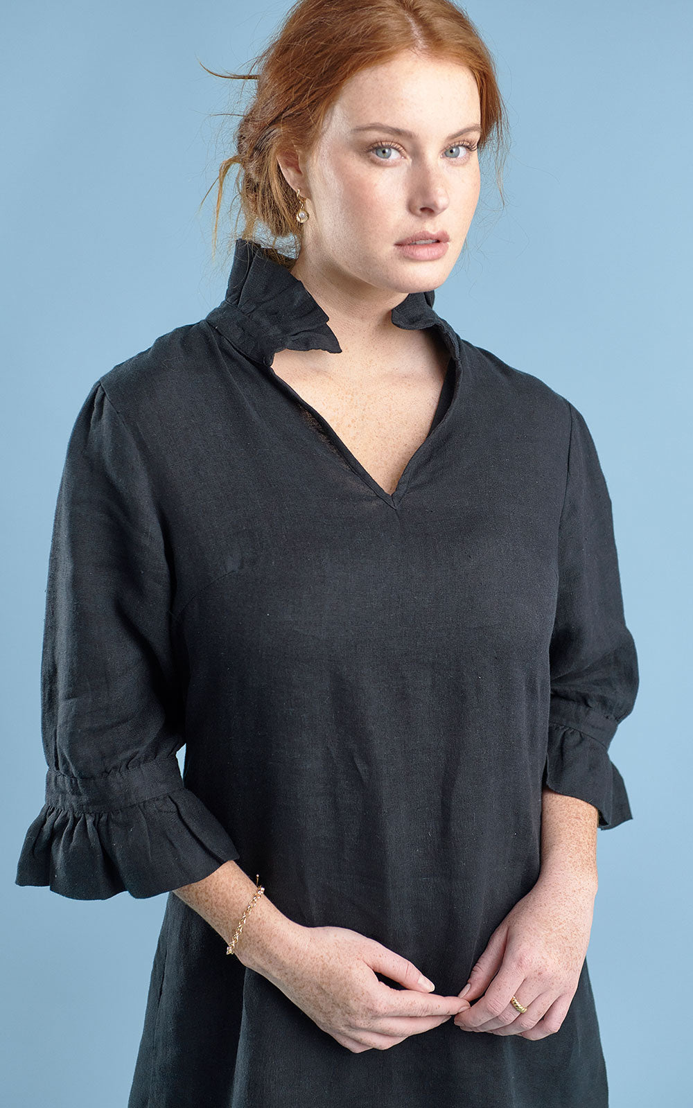 black linen mini dress with high neck frill and sleeves