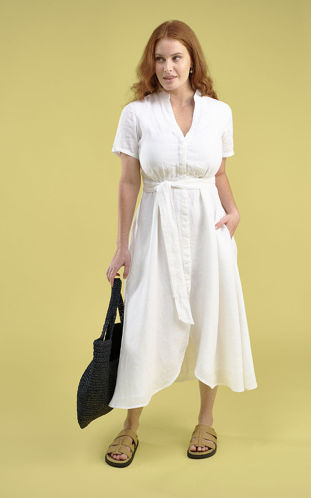 white linen maxi dress with v neck and middle leg split including tie belt