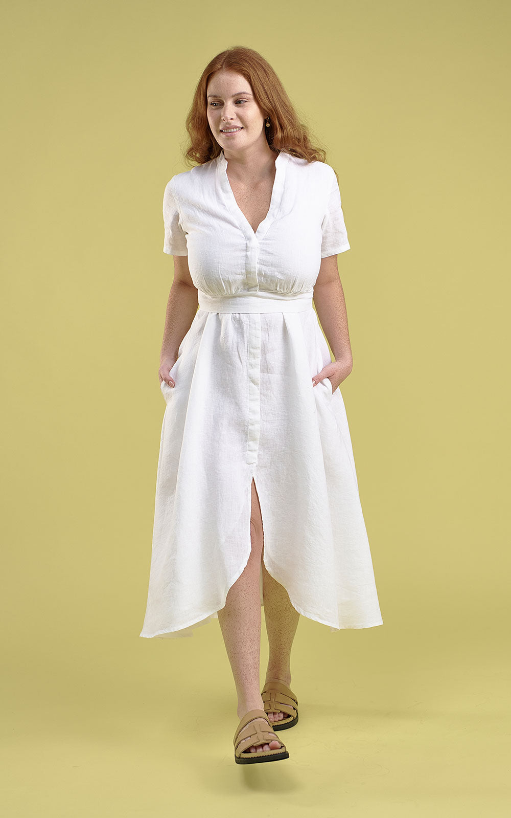 white linen maxi dress with v neck and middle leg split including tie belt