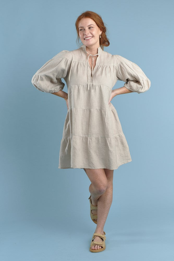 tiered mini dress with tie up neck in natural