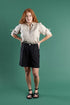 three quarter length tailored linen shorts in black