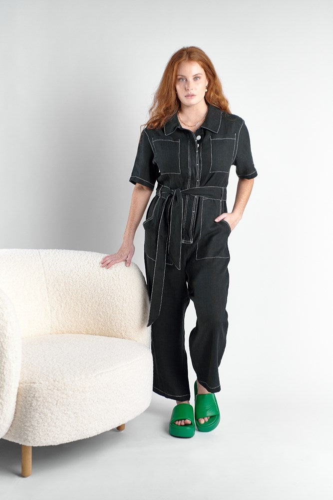 boiler suit in black linen with contrast stitching