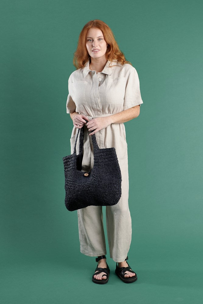 beach bag with button enclosure and cotton lining black