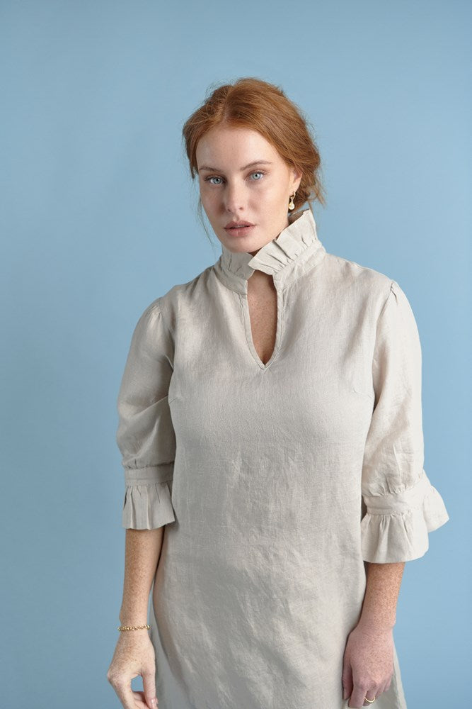 natural linen mini dress with high neck frill and sleeves
