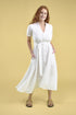 white linen maxi dress with v neck and middle leg split including tie belt