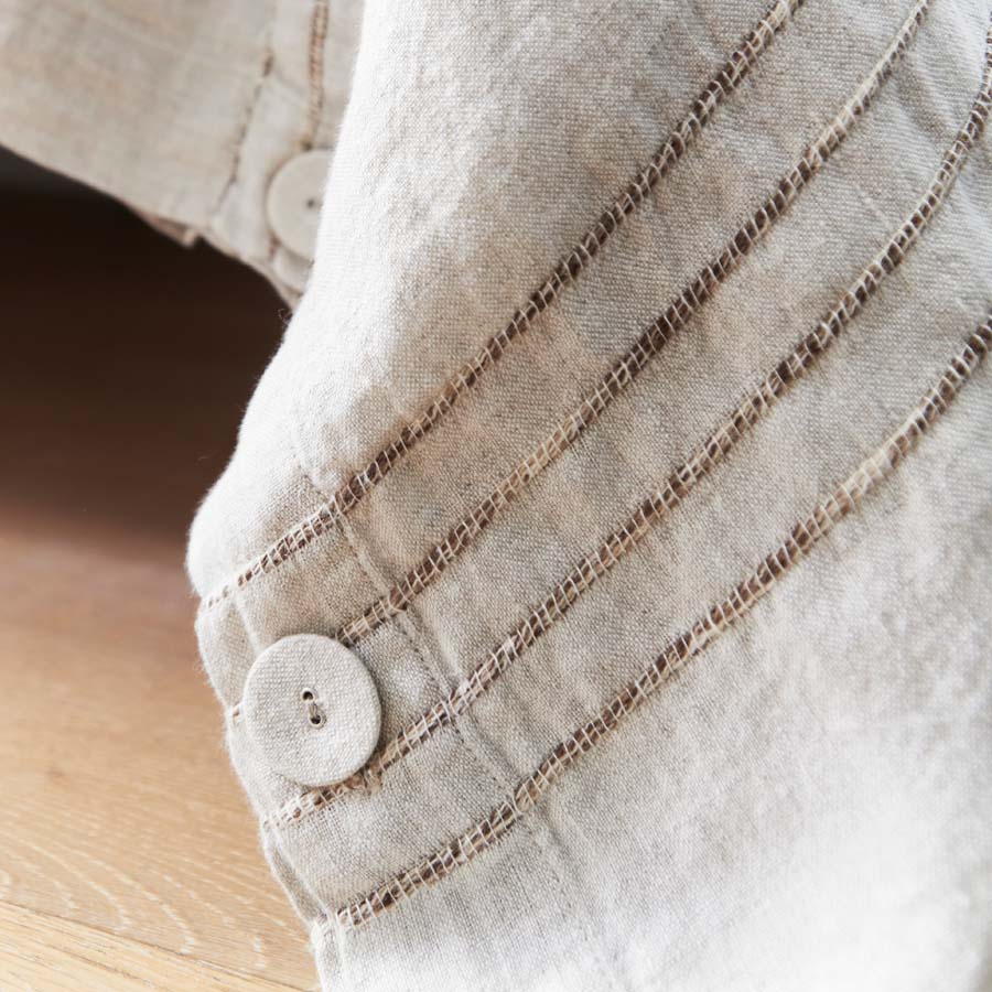 rockpool linen quilt cover and linen pillow cases in natural with organic stripe