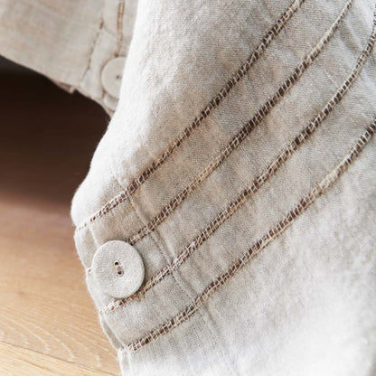 rockpool linen quilt cover and linen pillow cases in natural with organic stripe