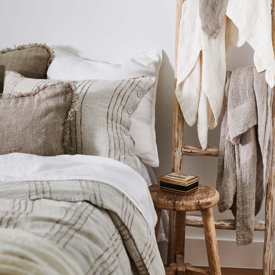 rockpool linen quilt cover and linen pillow cases in natural with organic stripe