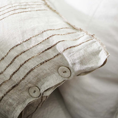 rockpool linen quilt cover and linen pillow cases in natural with organic stripe