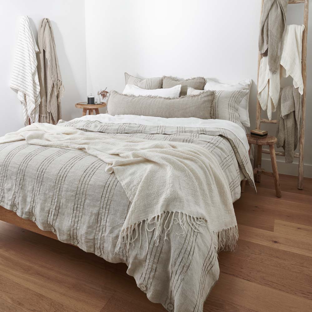 rockpool linen quilt cover and linen pillow cases in natural with organic stripe