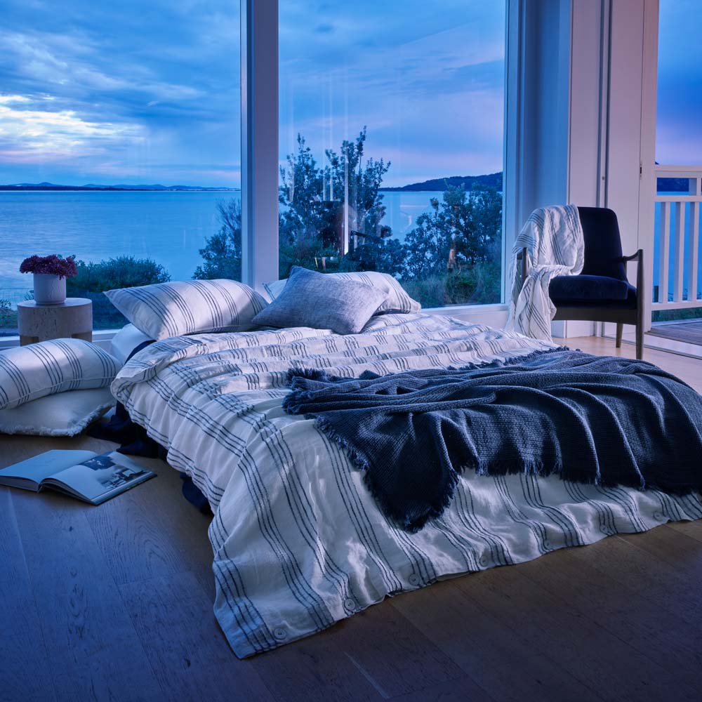 rockpool linen quilt cover and linen pillow cases in white with navy stripe