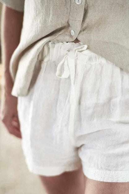 Tie waist on white linen shorts