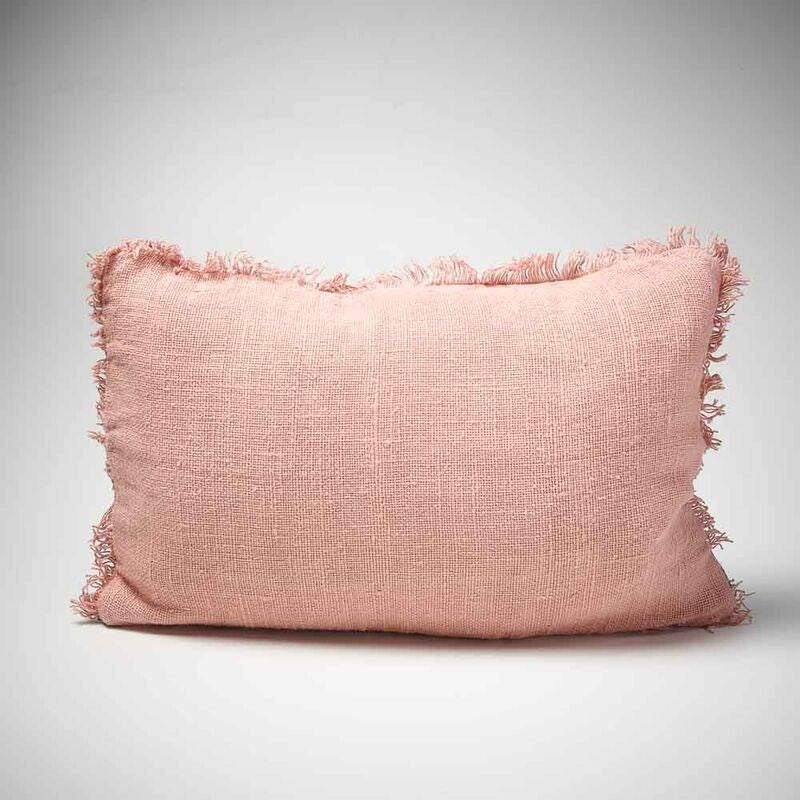 hand woven linen cushion in musk pink with fringing